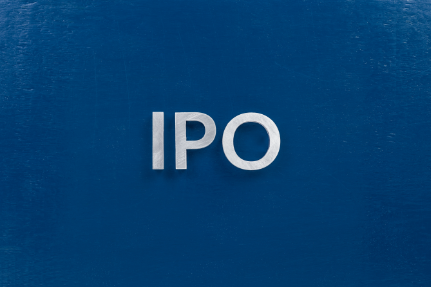 word IPO on a blue background